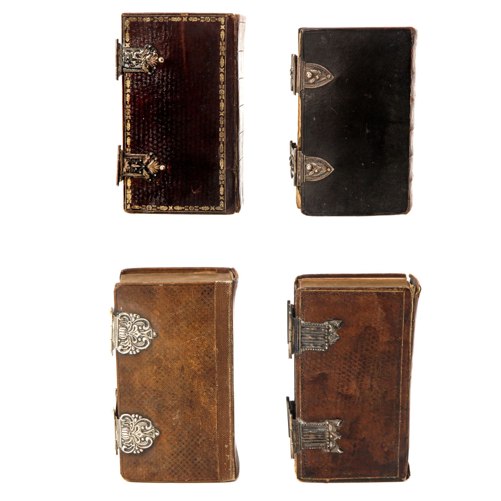 A Collection of 4 Bibles - Image 2 of 10