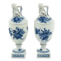 A Pair of Vases with Covers