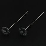 A Pair of Silver Hat Pins