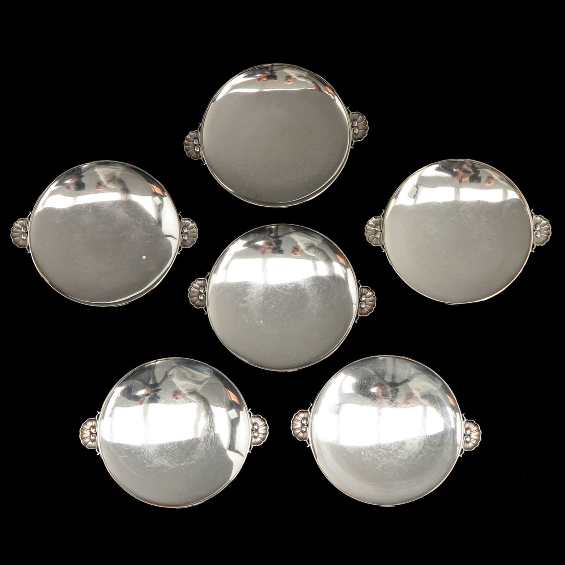 A Series of 6 Silver Georg Jensen Plates