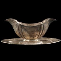 A Silver Gravy Boat and Tray