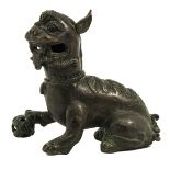 A Bronze Temple Lion Sculpture