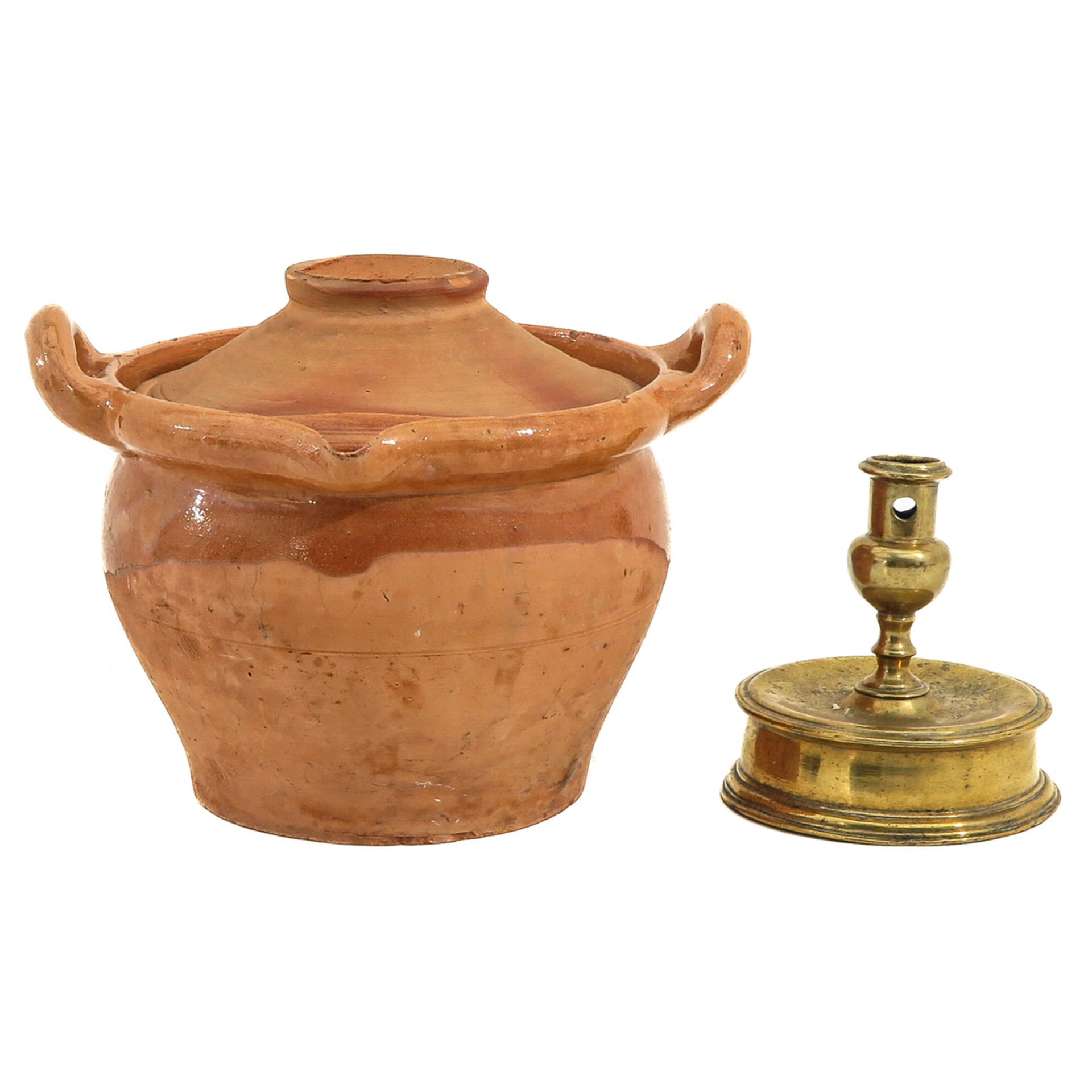 A Candlestick and Pot