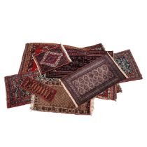A Collection of 8 Carpets