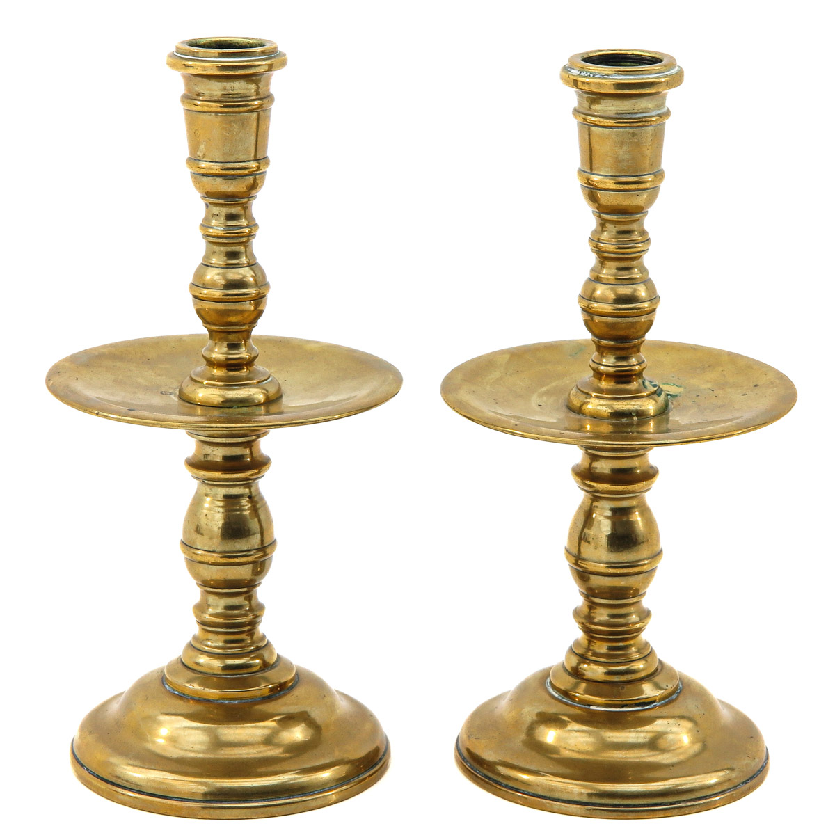 A Pair of Bronze Candlesticks