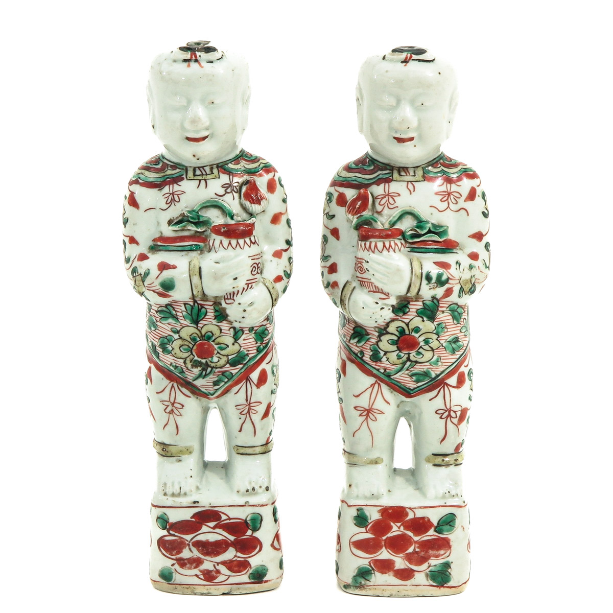 A Pair of Chinese Boy Sculptures