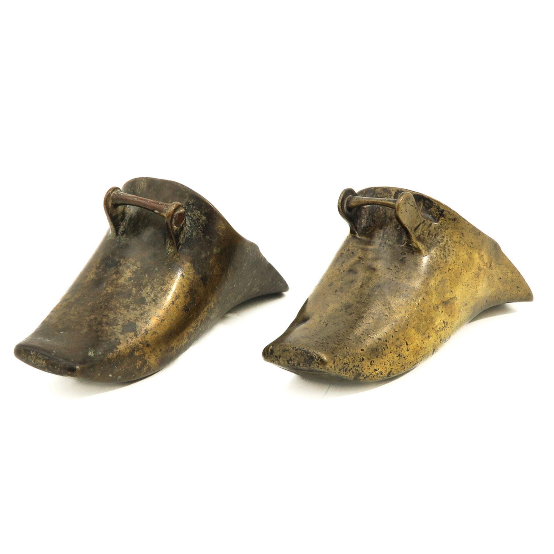 A Pair of 17th Century Bronze Boots