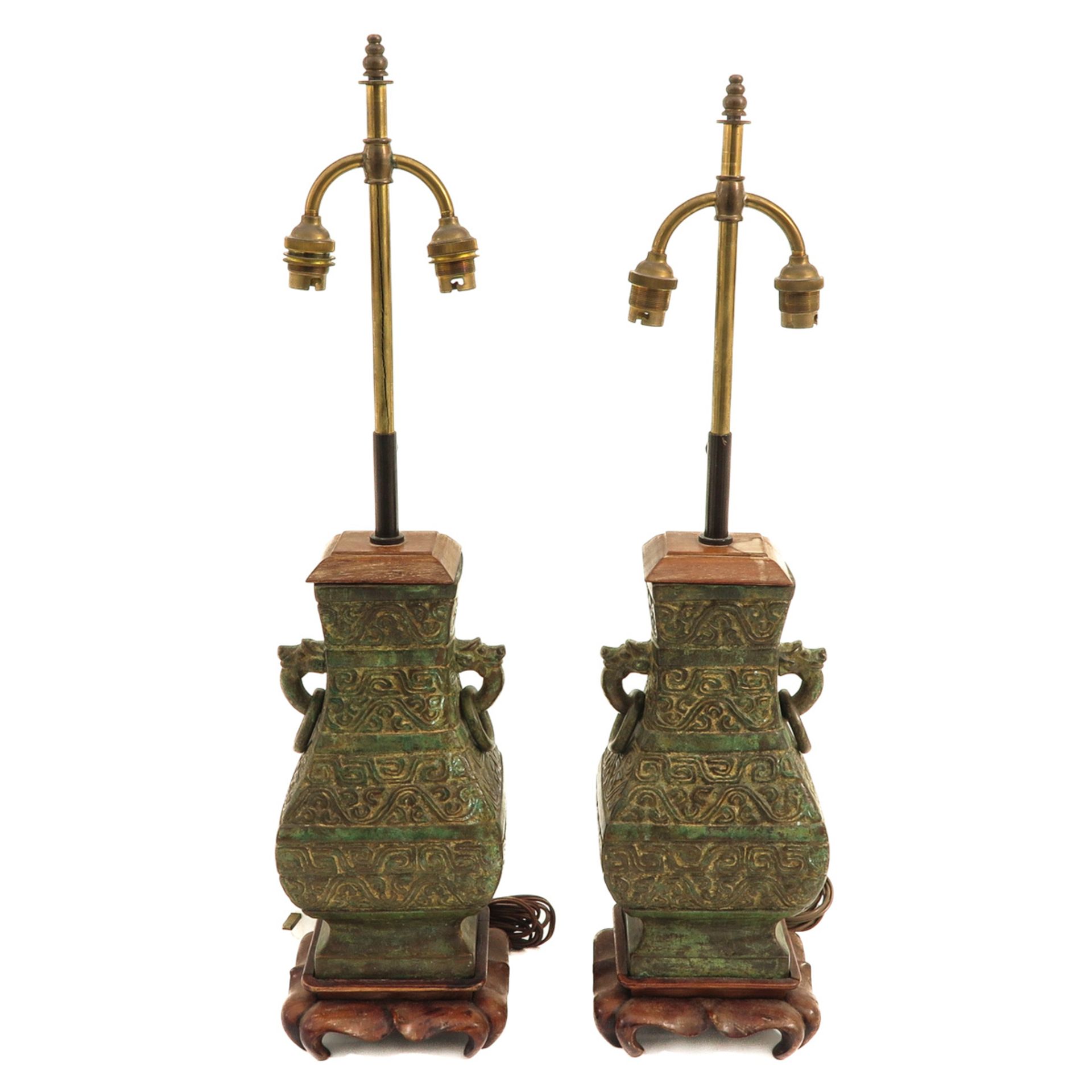 A Pair of Bronze Lamps