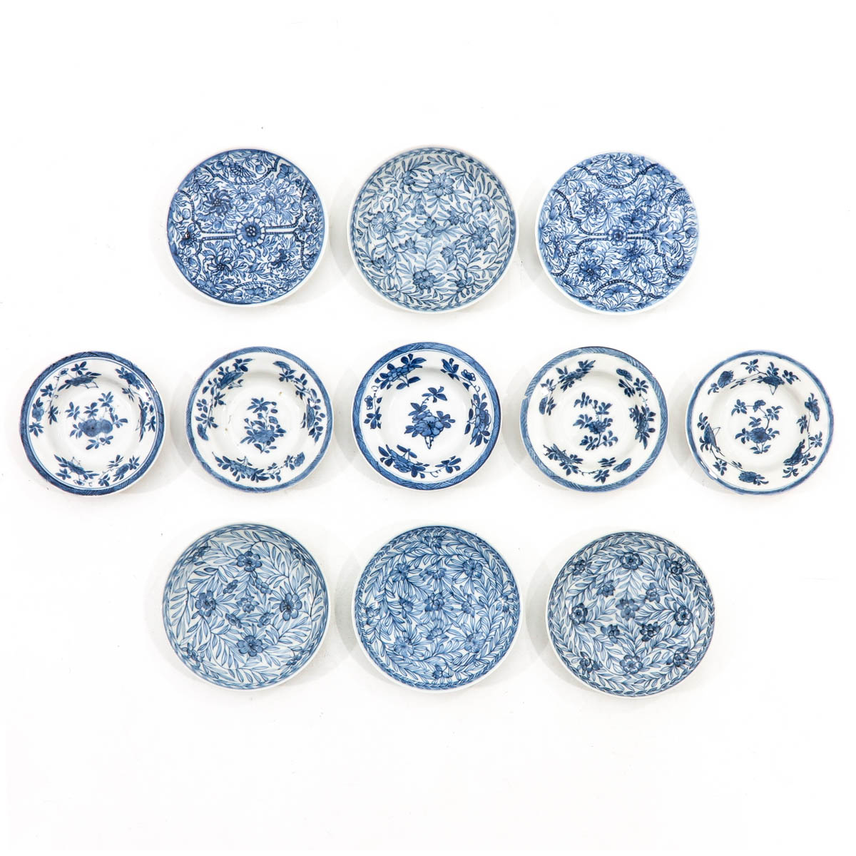 A Collection of 11 Miniature Plates