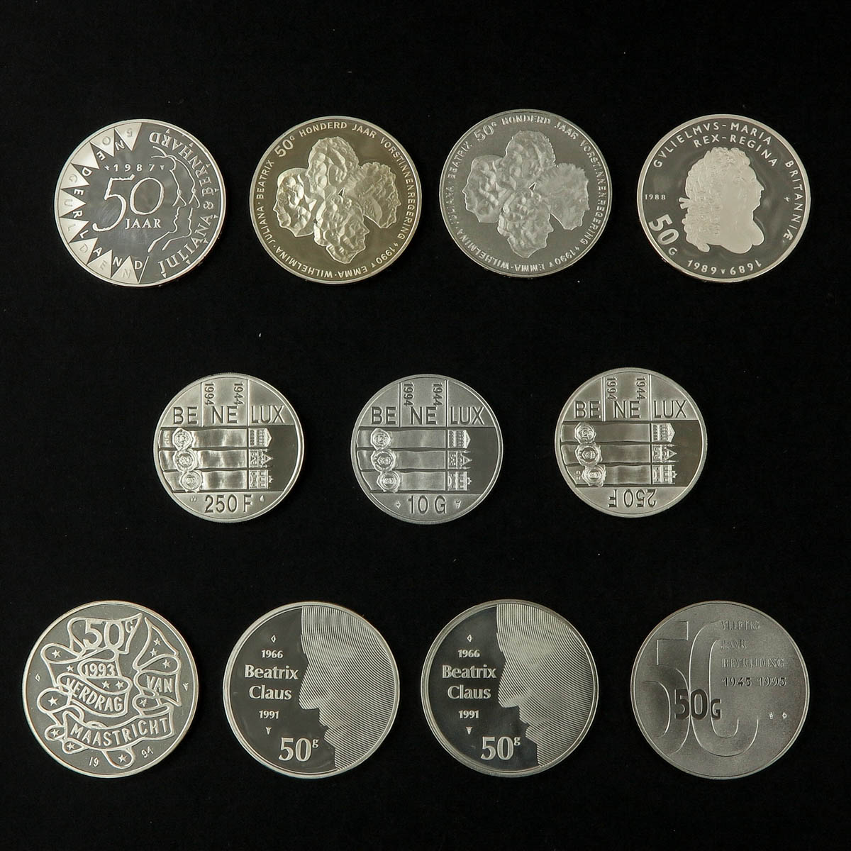 A Collection of 11 Silver Coins