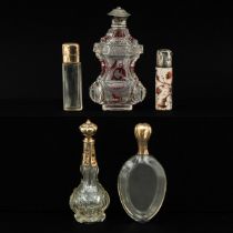 A Collection of 5 Perfume Bottles