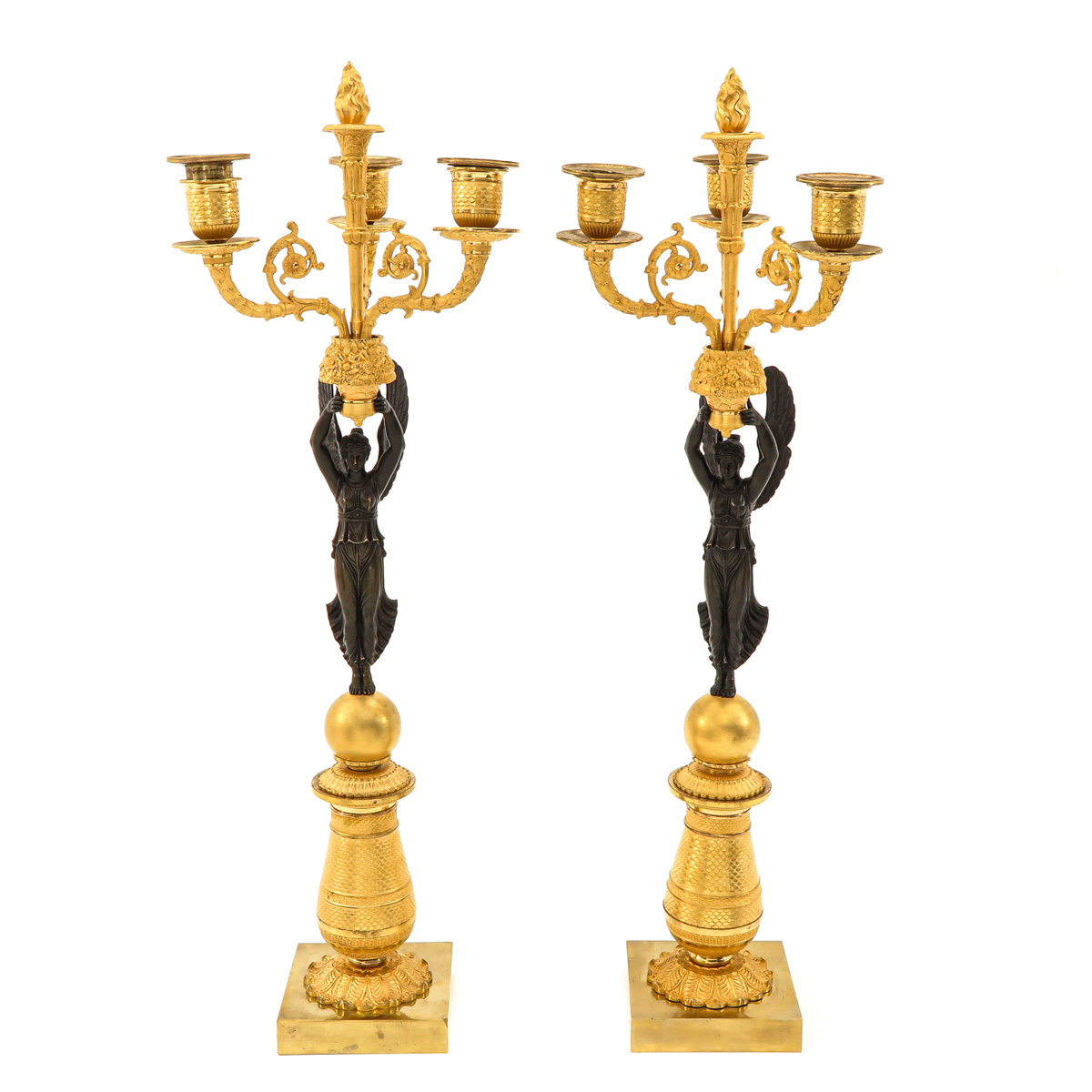 A Pair of Empire Period Candlesticks