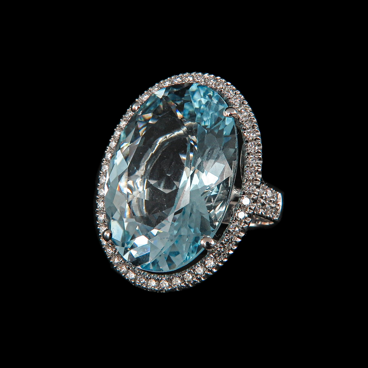 A Ladies Blue Topaz and Diamond Ring