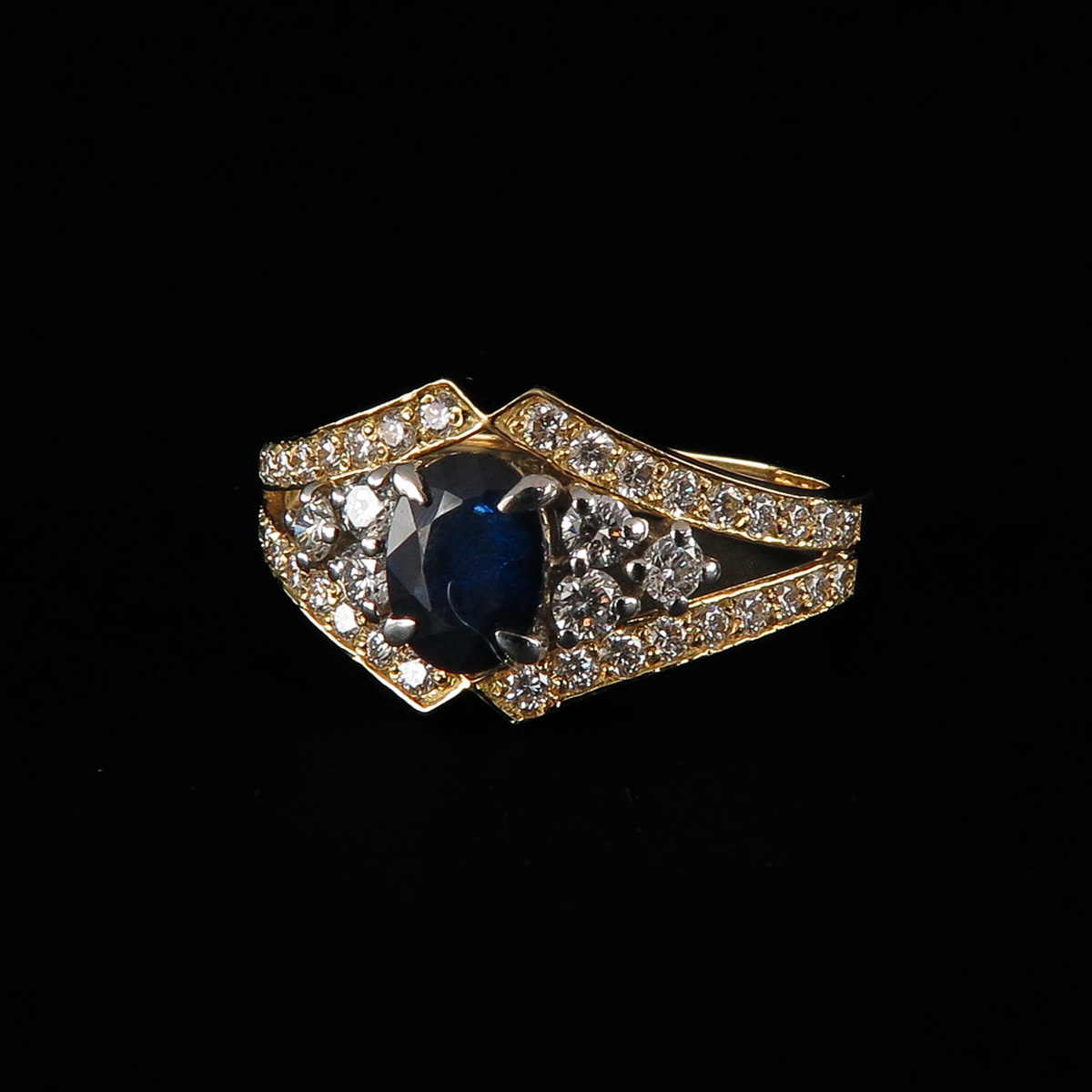 A Ladies Diamond and Sapphire Ring