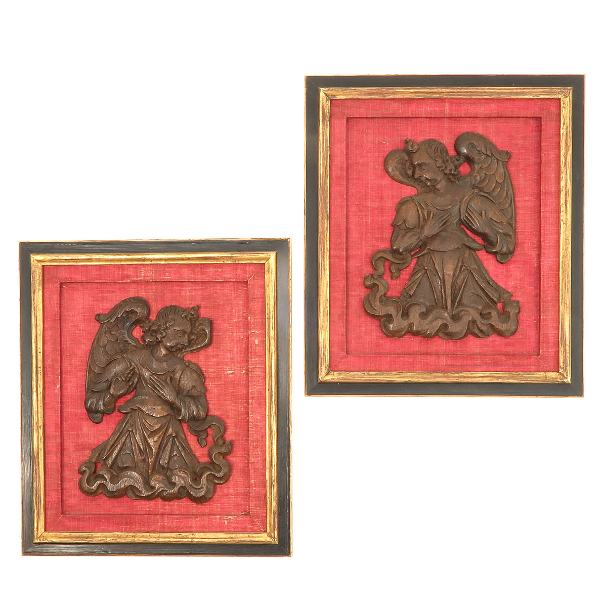 A Pair of Religious Carvings in Frames