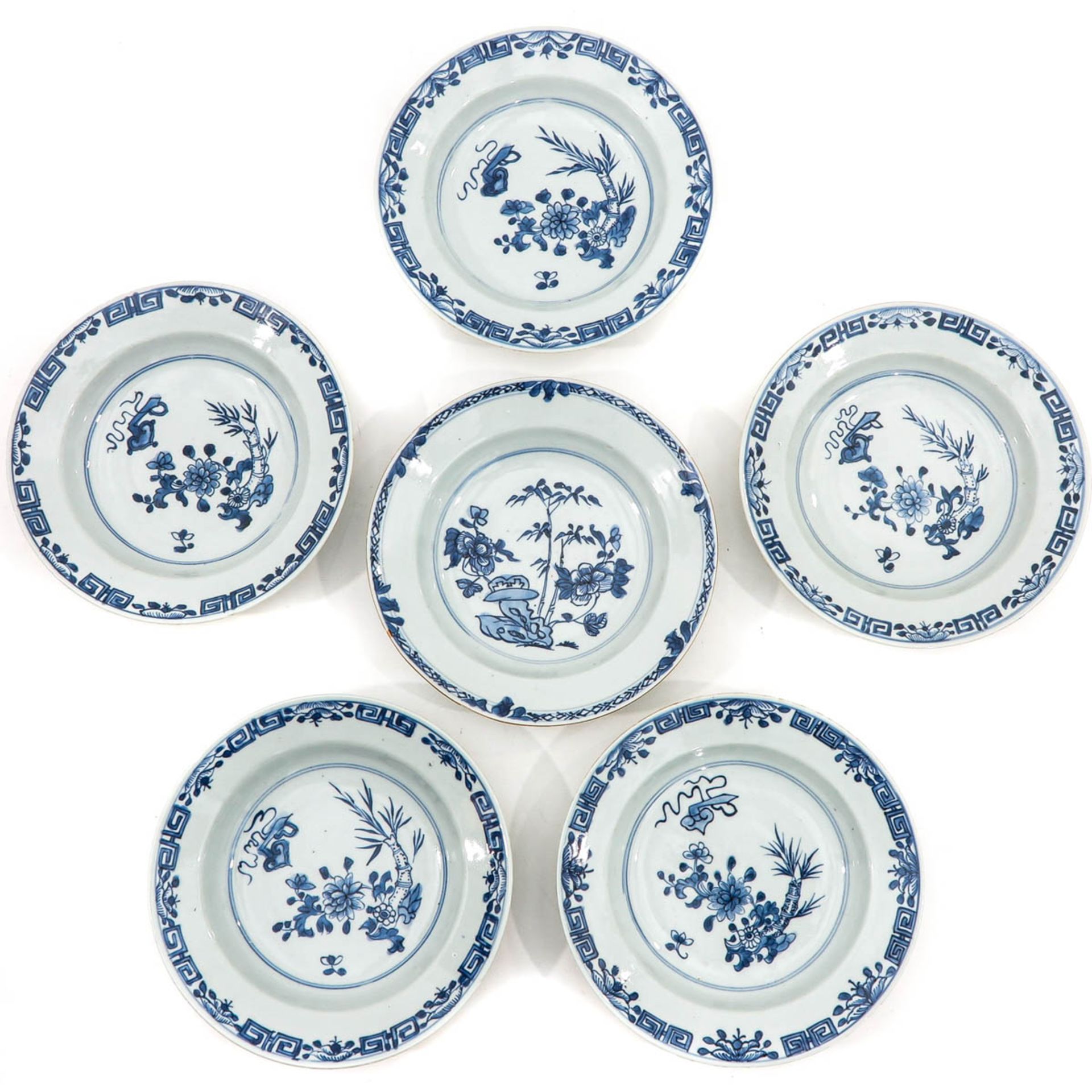 A Collection of 6 Blue and White Plates