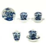 A Series of 4 Covered Cups and Saucers