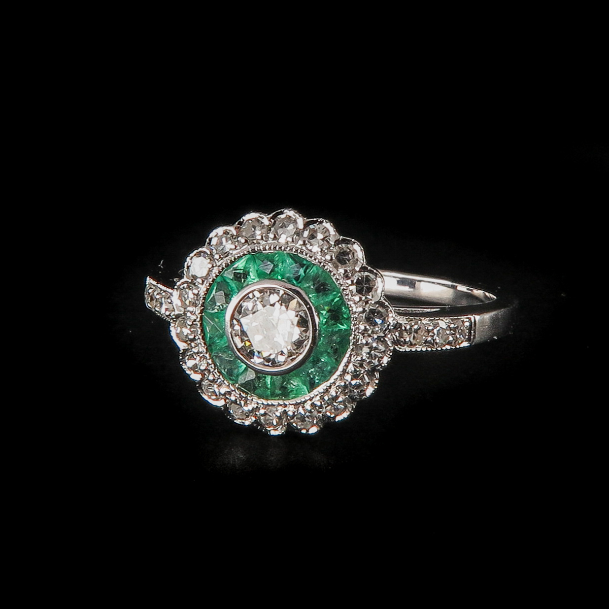 A Ladies Emerald and Diamond Ring