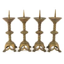 A Collection of 4 Bronze Altar Candlesticks