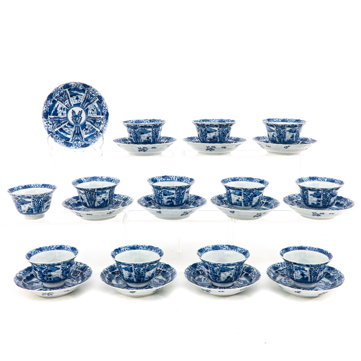 A Collection of 12 Cups and Saucers