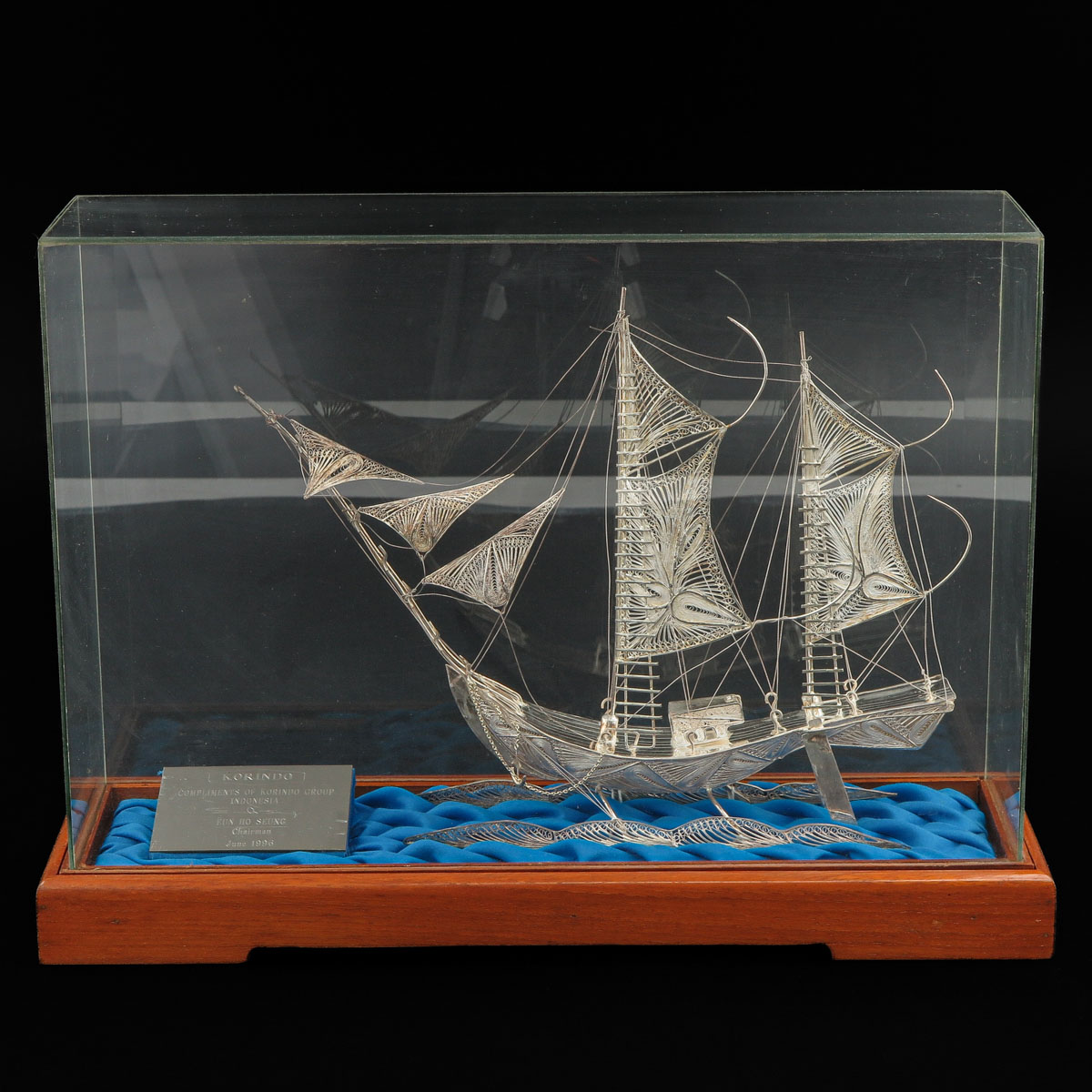 A Miniature Silver Sail Boat