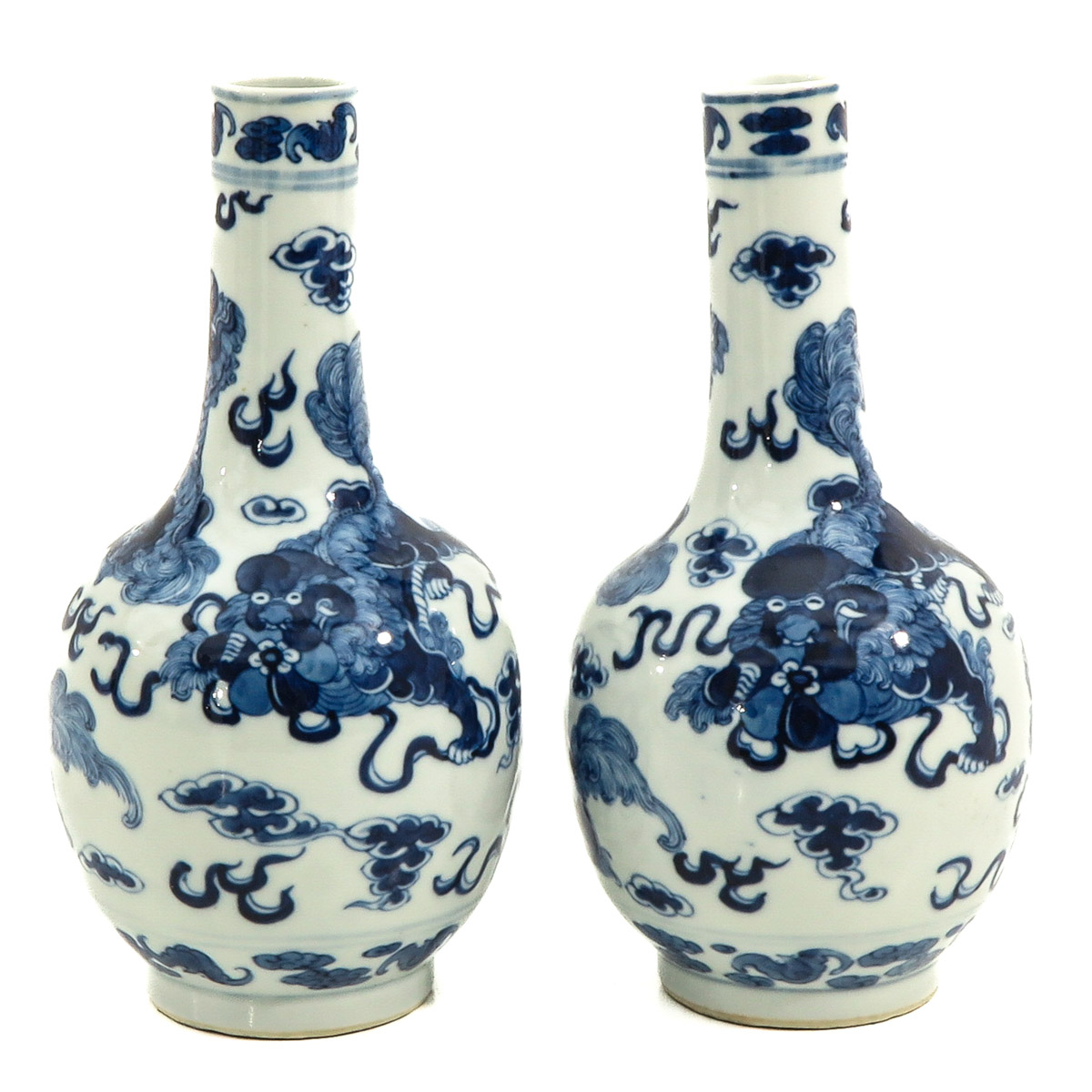 A Pair of Blue and White Bottle Vases