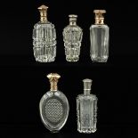A Collection of 5 Perfume Bottles