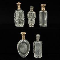 A Collection of 5 Perfume Bottles