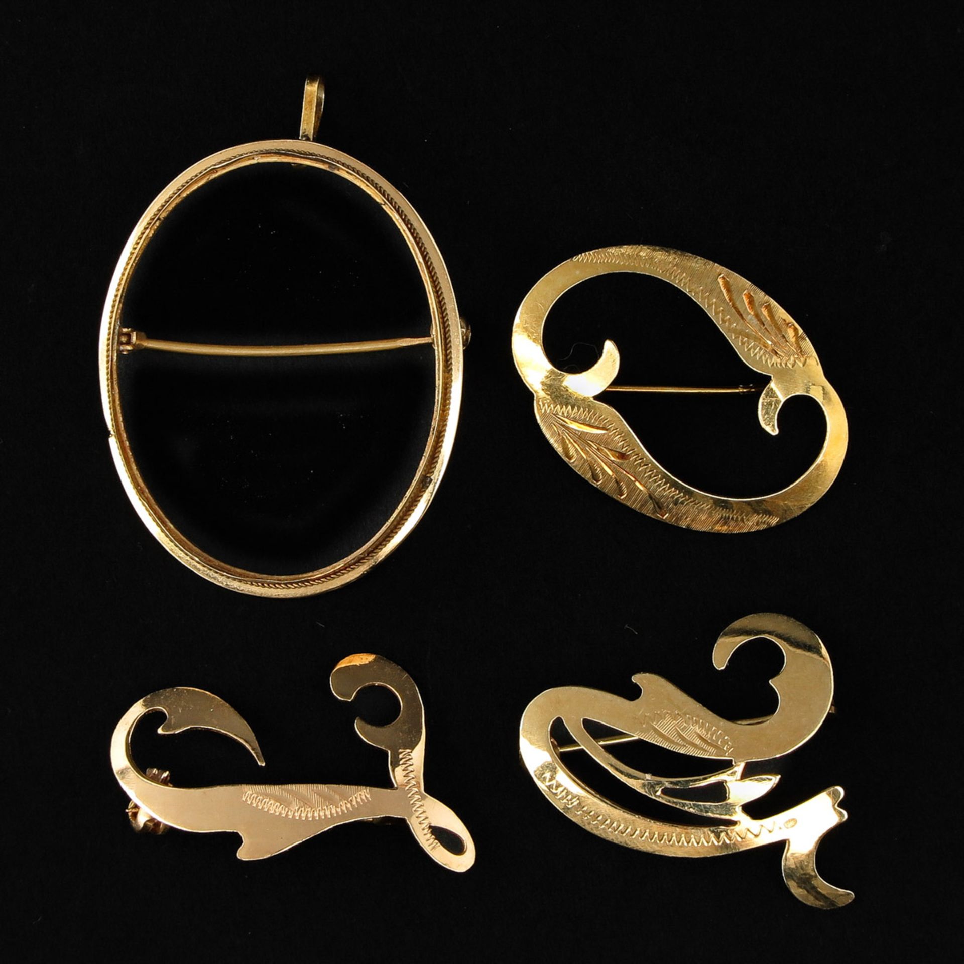 A Collection of 4 Brooches