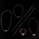 A Collection of Garnet Jewelry