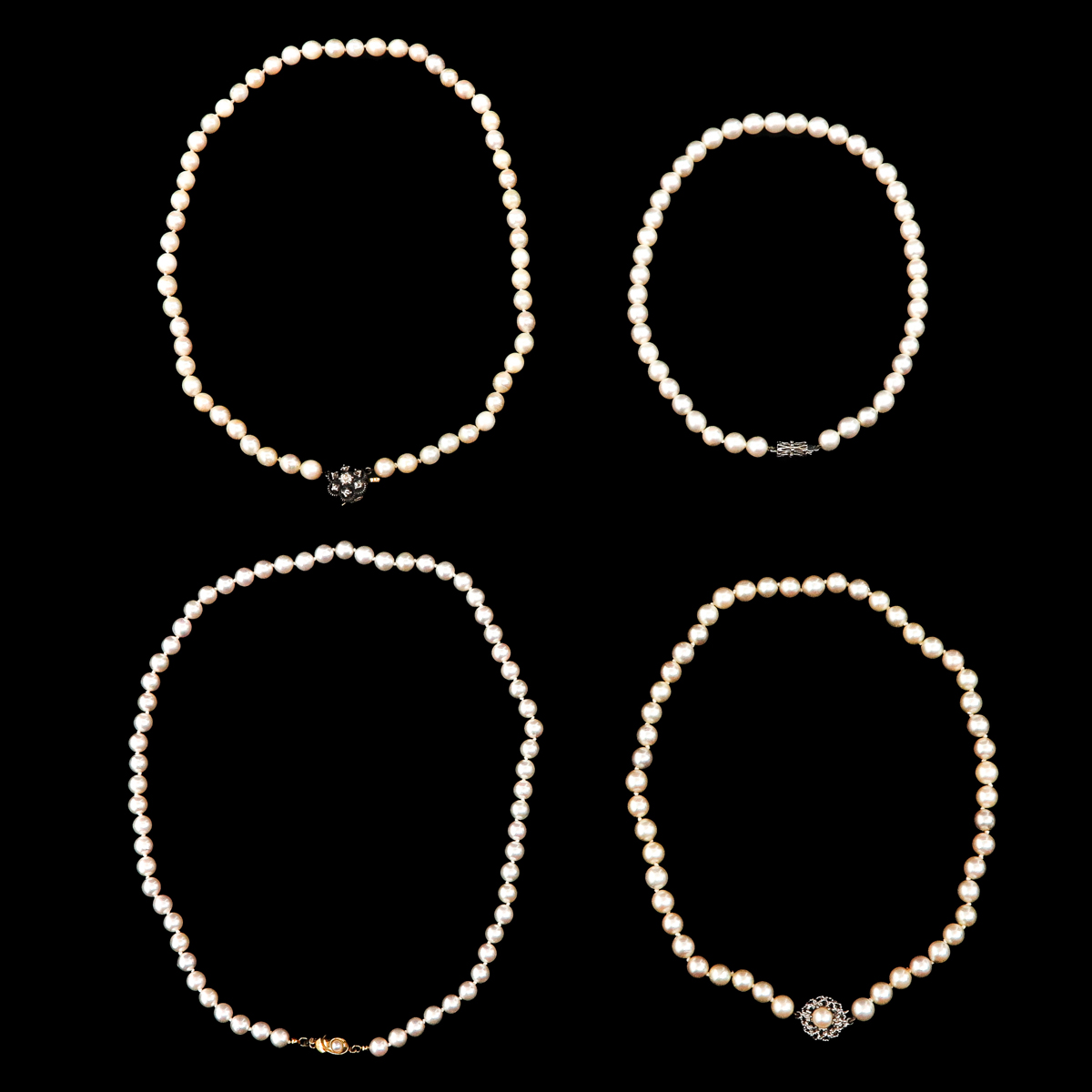 A Collection of 4 Pearl Necklaces