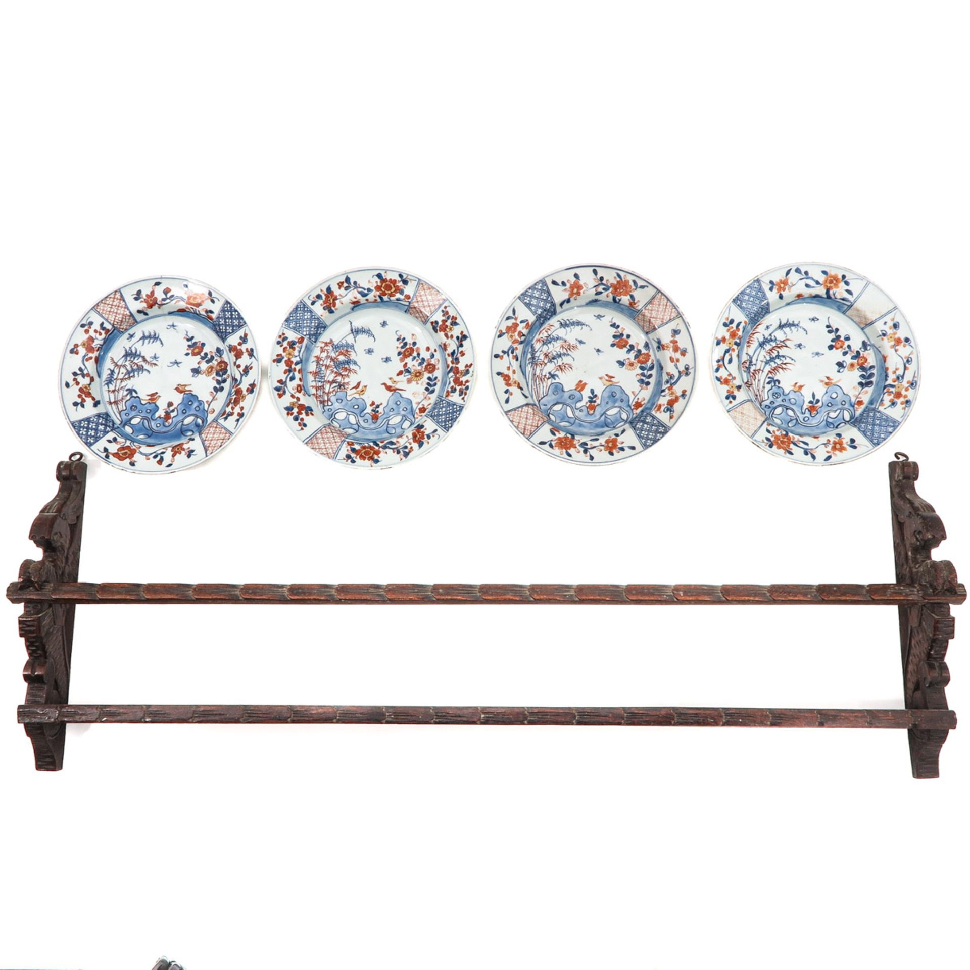 A Series of 4 Plates with Plate Rack