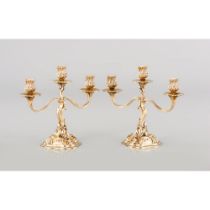 A Pair of Louis XV style three-light candelabra