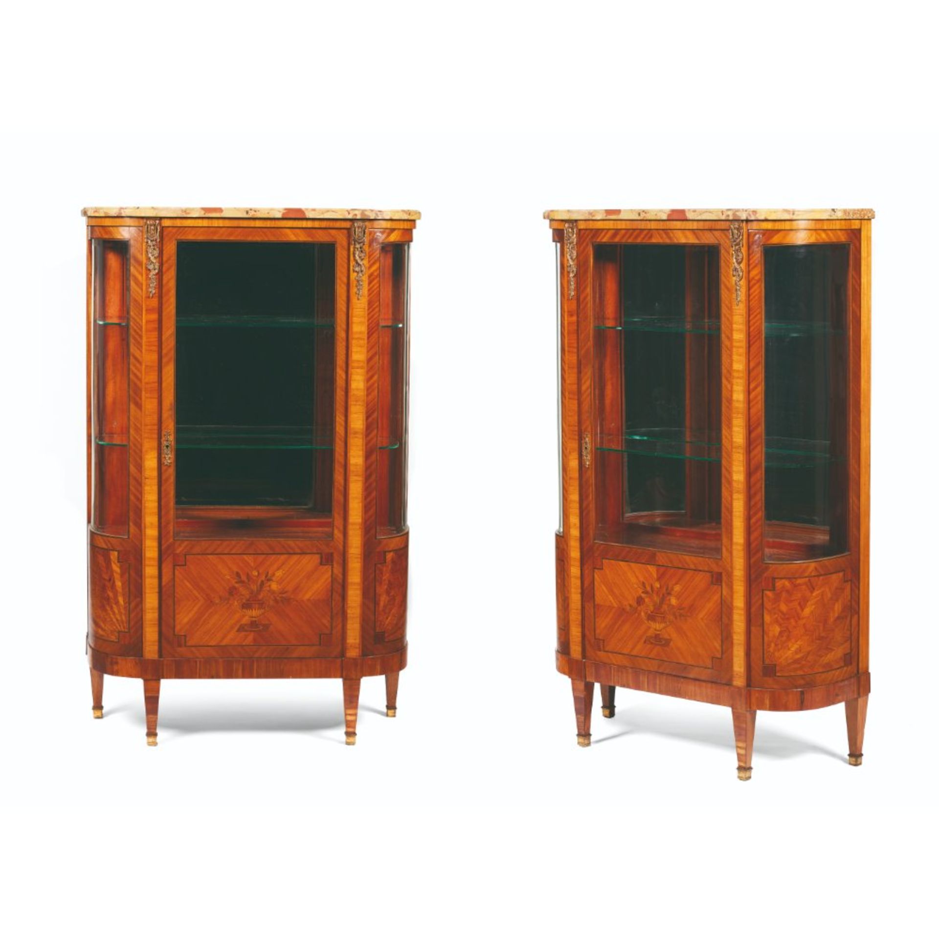 A Pair of Louis XVI style display cabinets