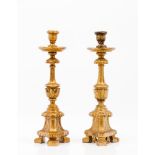 A pair of small candlestands