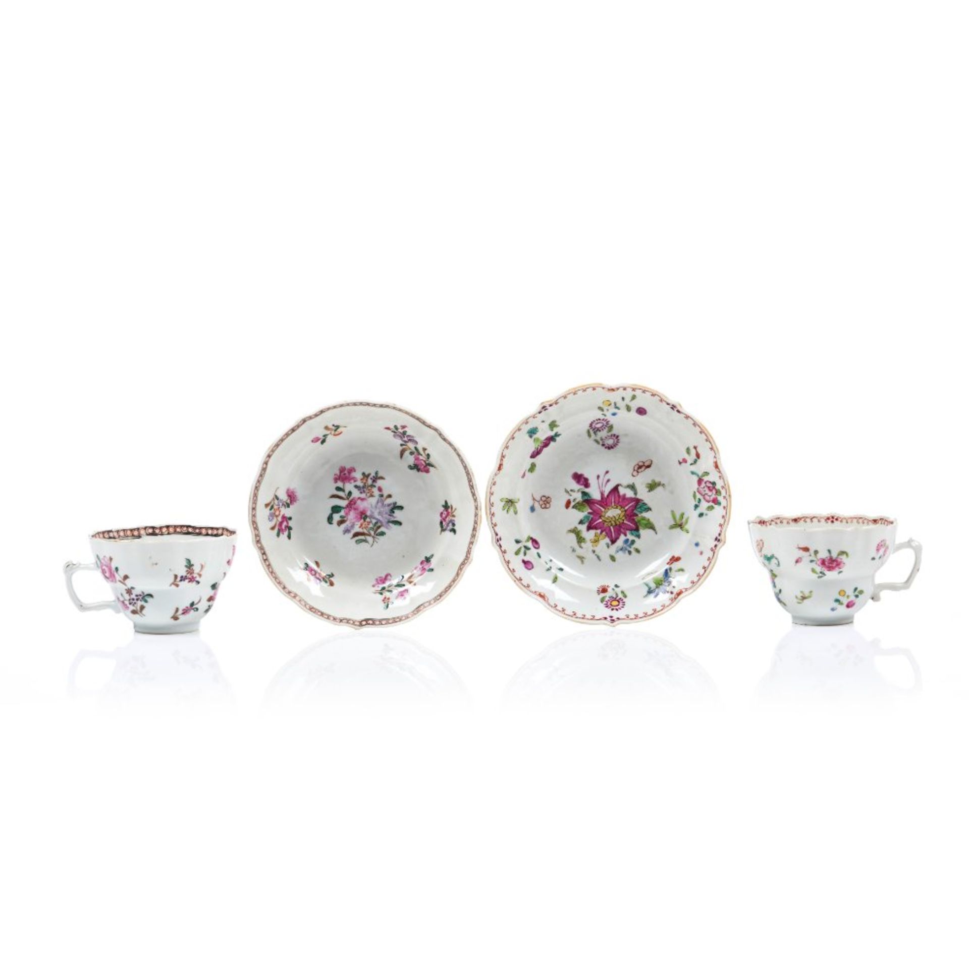 A set of two cups and saucers