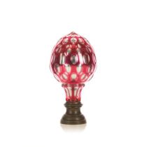 A pink mirrored two-tone glass pine cone