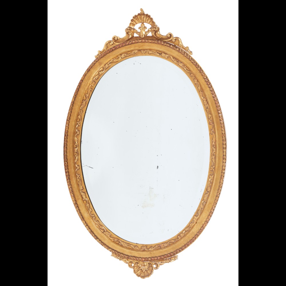  A Romantic era oval mirror