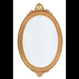  A Romantic era oval mirror