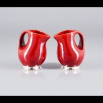 A pair of small jugs