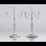  A pair of three branch candelabra