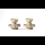  A pair of Qingbai stem cups and cup stands