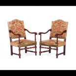  A pair of Louis XIV style armchairs