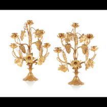 A pair of five branch Napoleon III candelabra