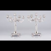 A pair of five branch candelabra