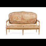  A pair of Louis XV style fauteuils and settee