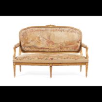 A pair of Louis XV style fauteuils and settee