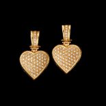  A pair of heart shaped earrings