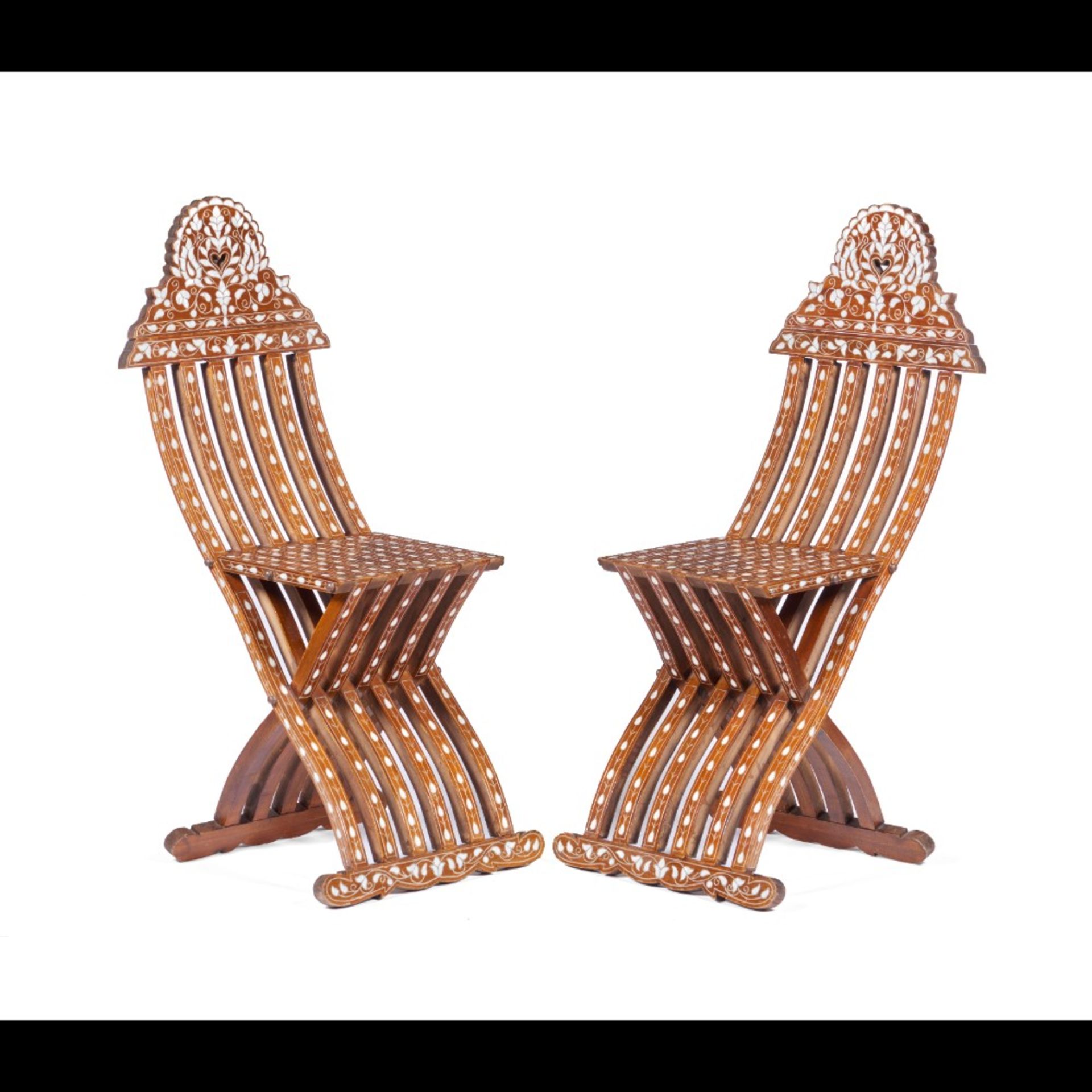  A pair of folding chairs