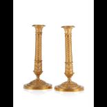  A pair of Empire style candlesticks